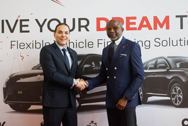 General Manager, Mikano Motors, Tarek Mostafa and Executive Director, Personal and Business Banking, United Bank for Africa, Chidi Okpala during a partnership signing ceremony between both parties, themed: ‘Drive Your Dreams Today’, a Flexible vehicle financing solutions, at the Mikano Showroom in Victoria Island