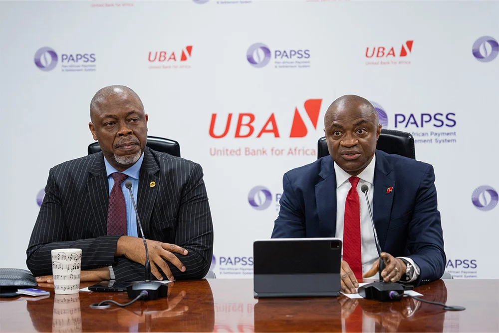 l-r: Chief Executive Officer at Pan-African Payment & Settlement System(PAPSS), Mike Ogbalu III and Group Managing Director/CEO, United Bank for Africa(UBA), Oliver Alawuba, during the press conference held to announce the successful integration of PAPPS into LEO, UBA’s AI-powered chatbot, enabling instant, seamless and secure transactions in local currencies between African countries, held at the Bank’s headquarters in Lagos on Wednesday.
