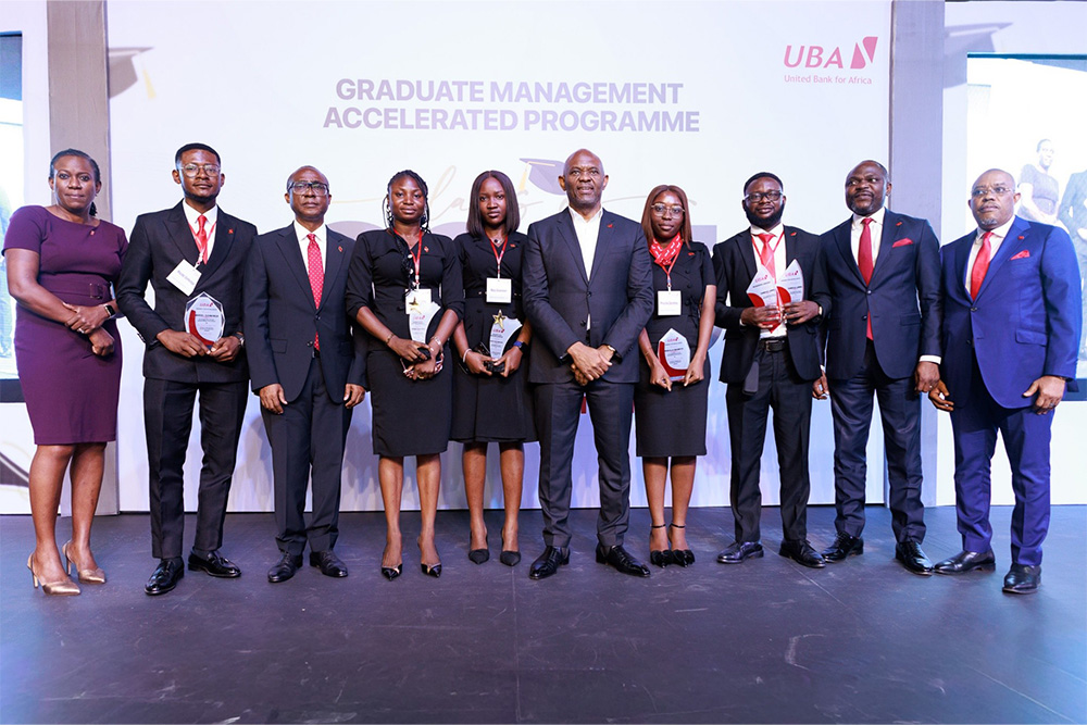 l-r: Group Head, Human Resources, Modupe Akindele (1st left), Group Deputy Managing Director, Chukwuma Nweke (3rd left), Group Chairman, United Bank for Africa, Tony Elumelu (5th right), Executive Director, Abuja & North Central, Alex Alozie (1st right); Group Deputy Managing Director, Muyiwa Akinyemi (2nd right); flanked by graduands of the 2025 Graduate Management Accelerated Programme (GMAP) class of United Bank for Africa(UBA), at the graduation ceremony held for over 700 trainees in Lagos at the weekend.