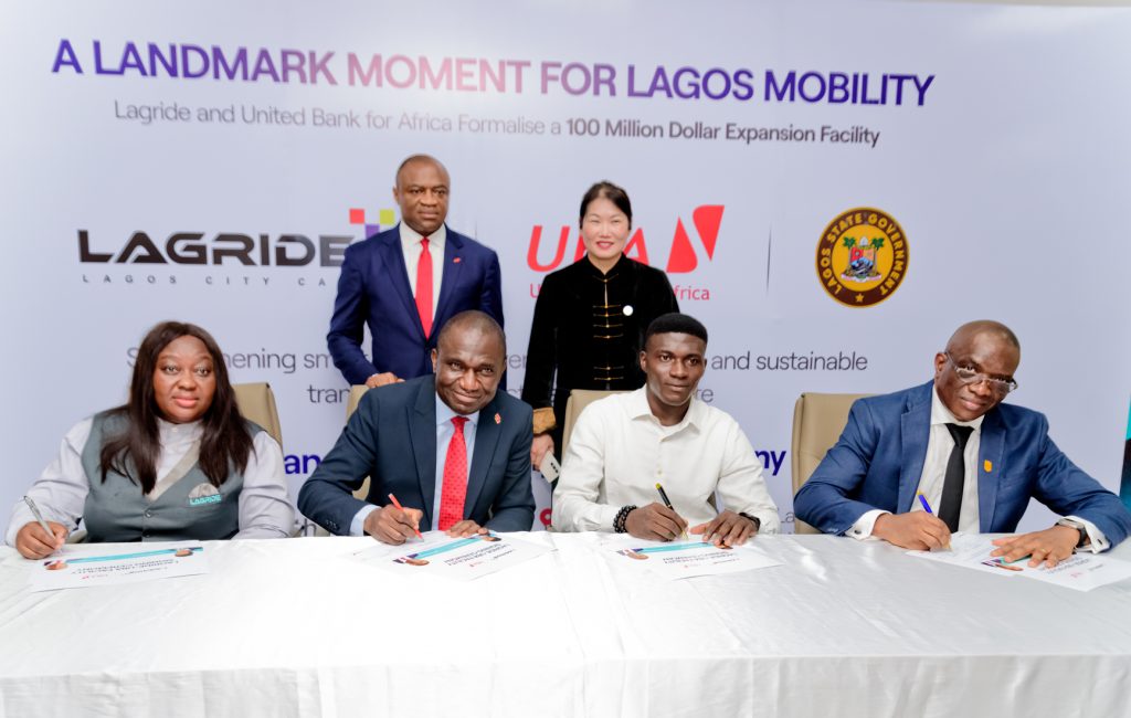 Sitting(l-r): Beneficiary and LagRide Driver, Dorothy Akpan Etim; Head, Small and Medium Enterprise(SME) United Bank for Africa(UBA), Babatude Ajayi; Head, LagRide Drivers Academy, Ademola Adeyemi; Special Adviser to Chairman of LagRide on Government Relations, Chukwuemeka, Udaya. Standing are Group Managing Director/CEO, United Bank for Africa(UBA) and, Chairman, LagRide, Chief Diana Chen, during the signing ceremony and launching of $100 Million "Drive to Own" Vehicle Financing Scheme, strengthening smart mobility, driver asset ownership of over 3,500 cars, financed by UBA, in partnership with Lagos State Government and LagRide, held in Lagos on Tuesday.
