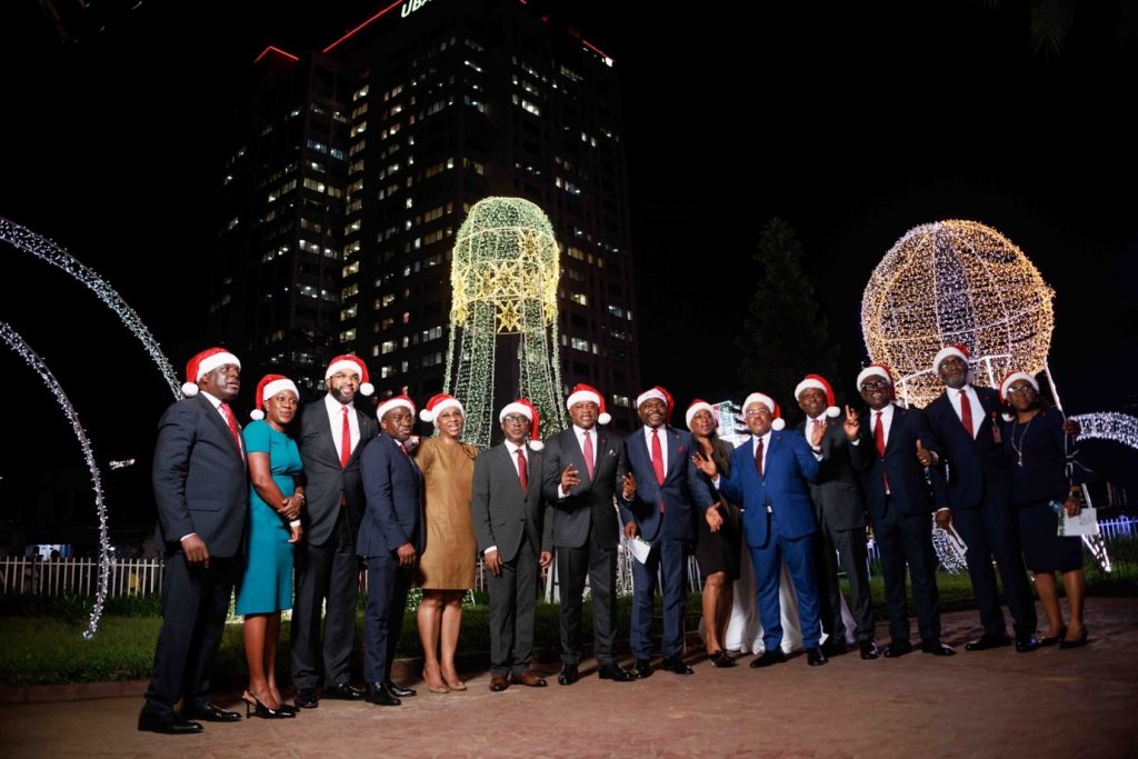 Group Managing Director/CEO, Oliver Alawuba; Deputy Managing Directors, Chukwuma Nweke and Muyiwa Akinyemi, flanked by some members of the Senior Executive Management of United Bank for Africa(UBA) during the UBA Christmas Light Up and Carol Evening, held at the UBA House and UBA Foundation Roundabout in Marina, Lagos on Monday
