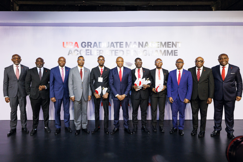 Executive Director, Personal and Business Banking, United Bank for Africa, Chidi Okpala; Group Executive, Treasury and Financial Institution, Samuel Ocheho; Executive Director, Finance and Risk Management, Ugo Nwaghodoh; Executive Director, Corporate Banking, Tosin Adewuyi; Group Managing Director, UBA, Oliver Alawuba, Executive Director; Deputy Managing Director, Chukwuma Nweke; Company Secretary, Bili Odum and Executive Director, Digital Banking, Emmanuel Lamptey flanked by prize winners of the 2026 Graduate Management Accelerated Programme(GMAP) during the graduation ceremony held for over 700 trainees cut across Africa, in Lagos on Thursday.