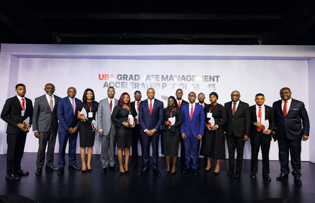 Executive Director, Personal and Business Banking, United Bank for Africa, Chidi Okpala; Executive Director, Finance and Risk Management, Ugo Nwaghodoh; Executive Director, Corporate Banking, Tosin Adewuyi; Group Managing Director, UBA, Oliver Alawuba, Executive Director; Deputy Managing Director, Chukwuma Nweke; Company Secretary, Bili Odum and Executive Director, Digital Banking, Emmanuel Lamptey flanked by prize winners of the 2026 Graduate Management Accelerated Programme(GMAP) during the graduation ceremony held for over 700 trainees cut across Africa, in Lagos on Thursday.