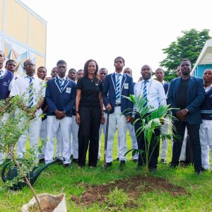 L - R: Managing Director/CEO, UBA Foundation, Bola Atta; Principal, CMS Grammar School, Jacob Ayokunle Ogunyinka, and Health, Safety and Environment (HSE) Manager, United  Bank for Africa (UBA), Khalid Agboola; flanked by students of CMS Grammar School, Bariga, during the UBA Foundation Tree Planting Exercise held at the school, in commemoration of World Environment Day 2026, on Friday