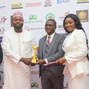L–R: Special Adviser to the Governor of Kano State, Alhaji Tijani S.S.; Head, Audit Transformation, Business Process and Policy Governance, United Bank for Africa (UBA), Olayemi Alawode; and broadcaster, Happiness Owonte, during the presentation of the Best Financial Services Company award to UBA at the 2026 National Sustainability Achievements Awards in Lagos, recently