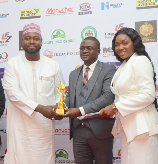 L–R: Special Adviser to the Governor of Kano State, Alhaji Tijani S.S.; Head, Audit Transformation, Business Process and Policy Governance, United Bank for Africa (UBA), Olayemi Alawode; and broadcaster, Happiness Owonte, during the presentation of the Best Financial Services Company award to UBA at the 2026 National Sustainability Achievements Awards in Lagos, recently