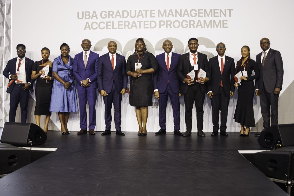 Group Chairman, United Bank for Africa, Tony Elumelu (7th left); Group Managing Director, UBA, Oliver Alawuba, (5th Left); Group Head, Human Resources, Modupe Akindele (3rd left) and Executive Director, Finance, Ugo Nwaghodoh , flanked by best the graduands of the 2026 Graduate Management Accelerated Programme(GMAP) class of UBA Academy, during the graduation ceremony held for over 374 trainees from across Africa, in Lagos on Thursday.