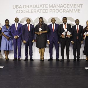 Group Chairman, United Bank for Africa, Tony Elumelu (7th left); Group Managing Director, UBA, Oliver Alawuba, (5th Left); Group Head, Human Resources, Modupe Akindele (3rd left) and Executive Director, Finance, Ugo Nwaghodoh , flanked by best the graduands of the 2026 Graduate Management Accelerated Programme(GMAP) class of UBA Academy, during the graduation ceremony held for over 374 trainees from across Africa, in Lagos on Thursday.