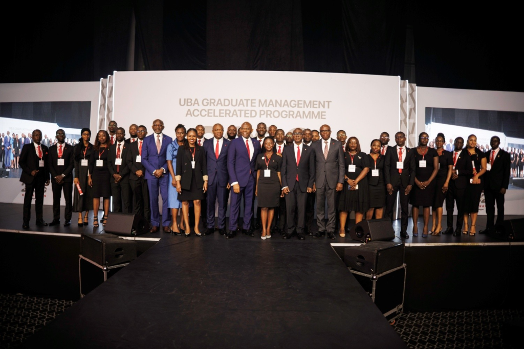 Executive Director designate, Personal and Business Banking, United Bank for Africa, Chidi Okpala; Group Managing Director, UBA, Oliver Alawuba; Group Chairman, United Bank for Africa, Tony Elumelu; Deputy Managing Director, Chukwuma Nweke and Executive Director, Finance, Ugo Nwaghodoh, flanked by some of the graduands of the 2026 Graduate Management Accelerated Programme(GMAP) class of UBA Academy, during the graduation ceremony held for over 374 trainees from across Africa, in Lagos on Thursday.
